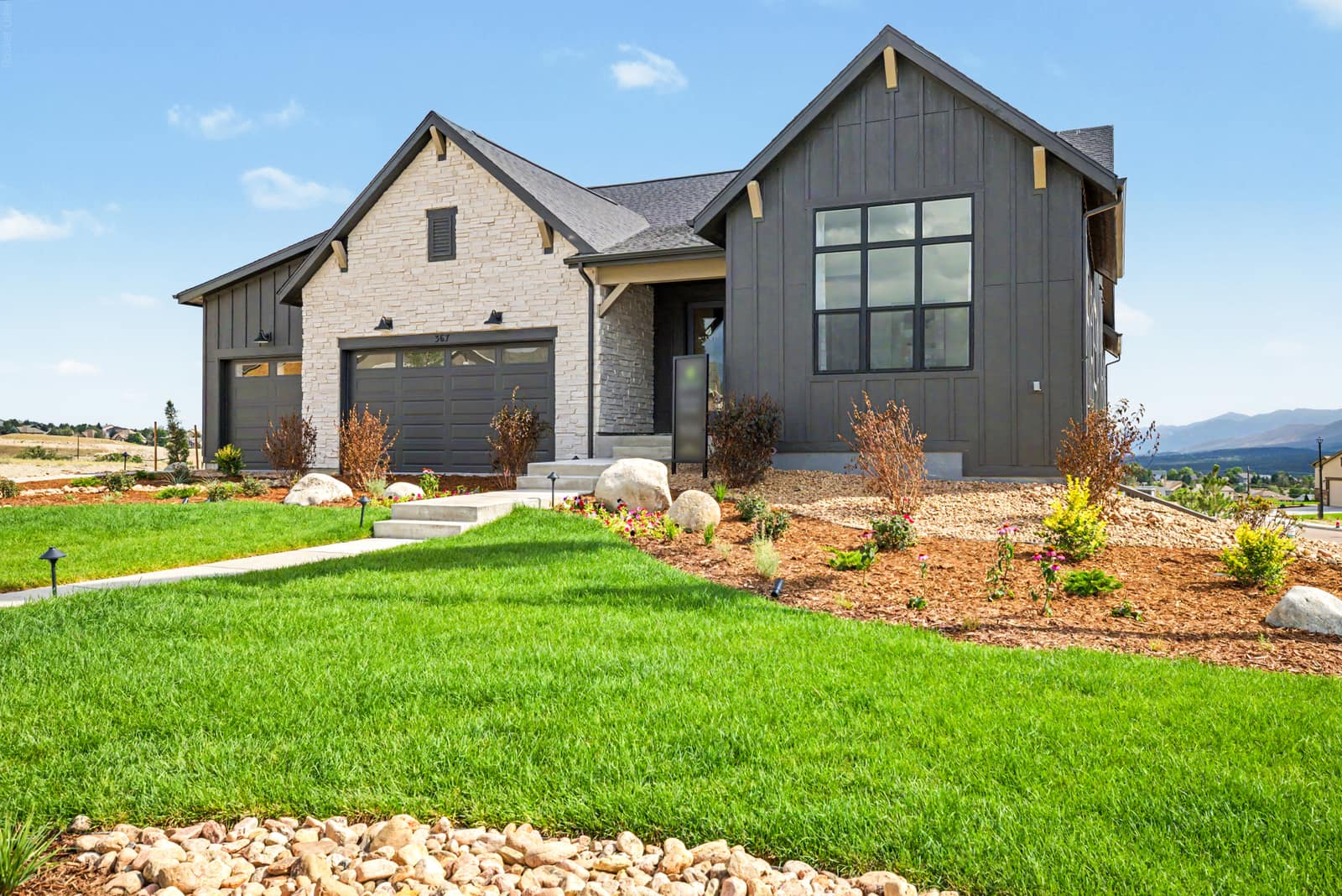 Home exterior with landscaped grounds at Jackson Creek in Monument, CO 80132
