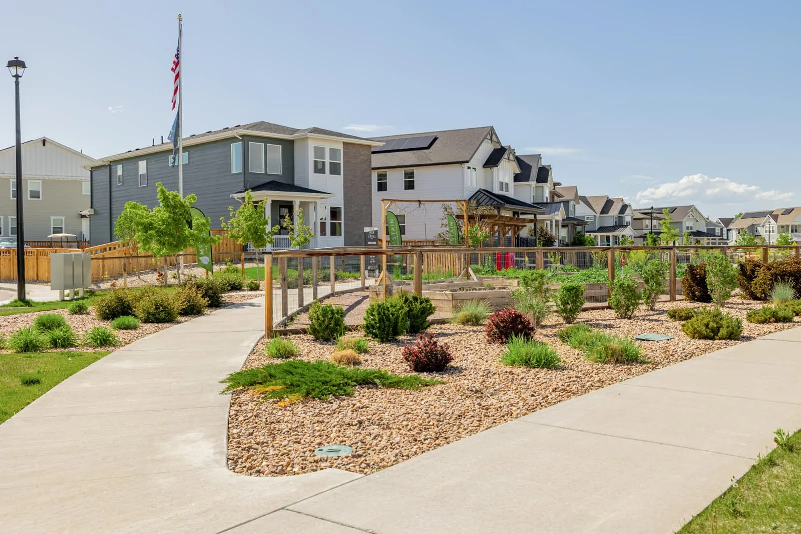 Landscaped neighborhood walking path at Arras Park in Thornton, CO 80229