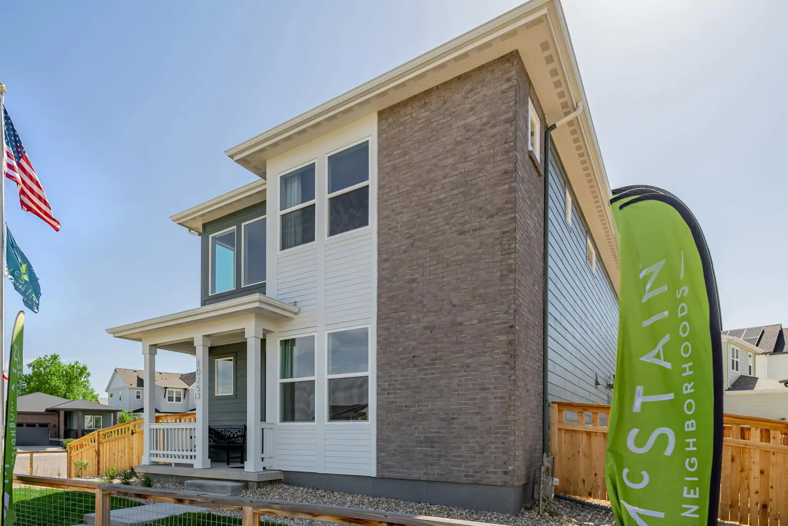 Side view of a three-story home at Arras Park in Thornton, CO 80229