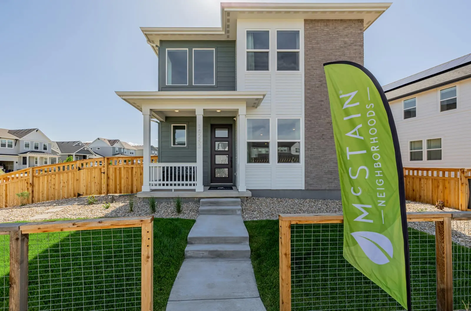 Three-story home exterior at Arras Park in Thornton, CO 80229