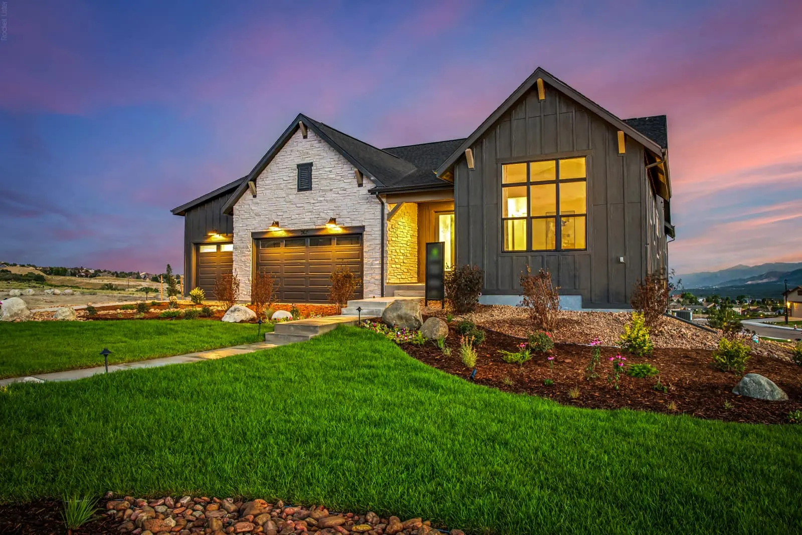 Home exterior with landscaped grounds at Jackson Creek in Monument, CO 80132