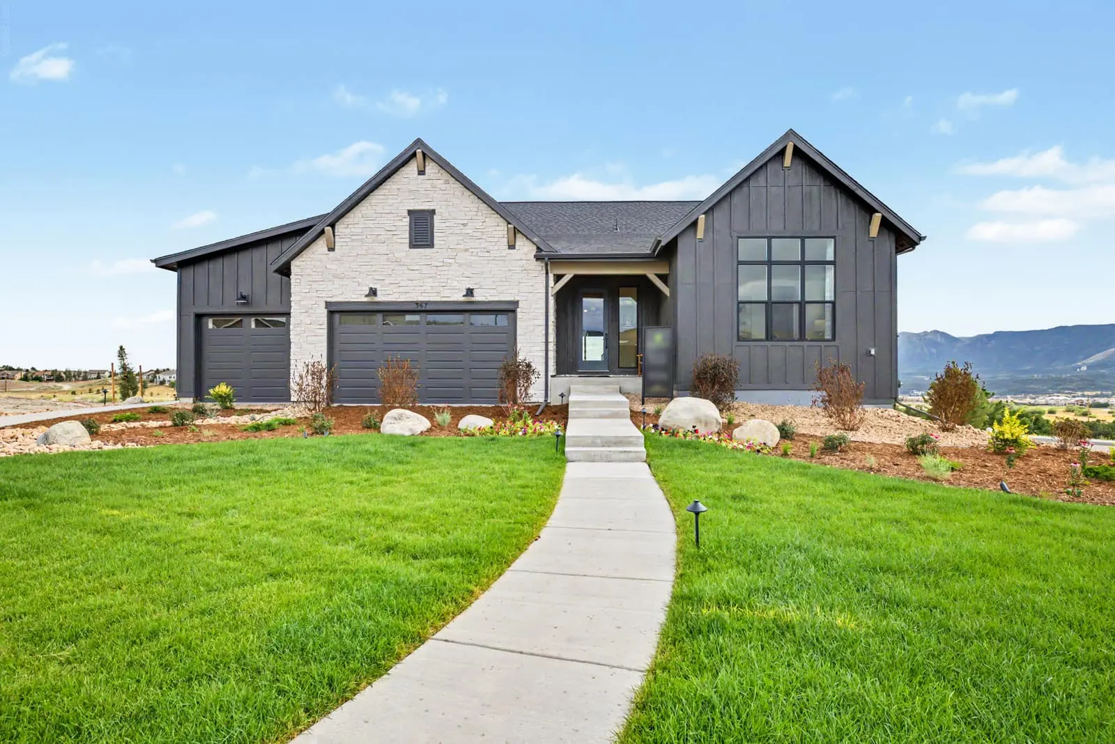 Home exterior with landscaped grounds at Jackson Creek in Monument, CO 80132