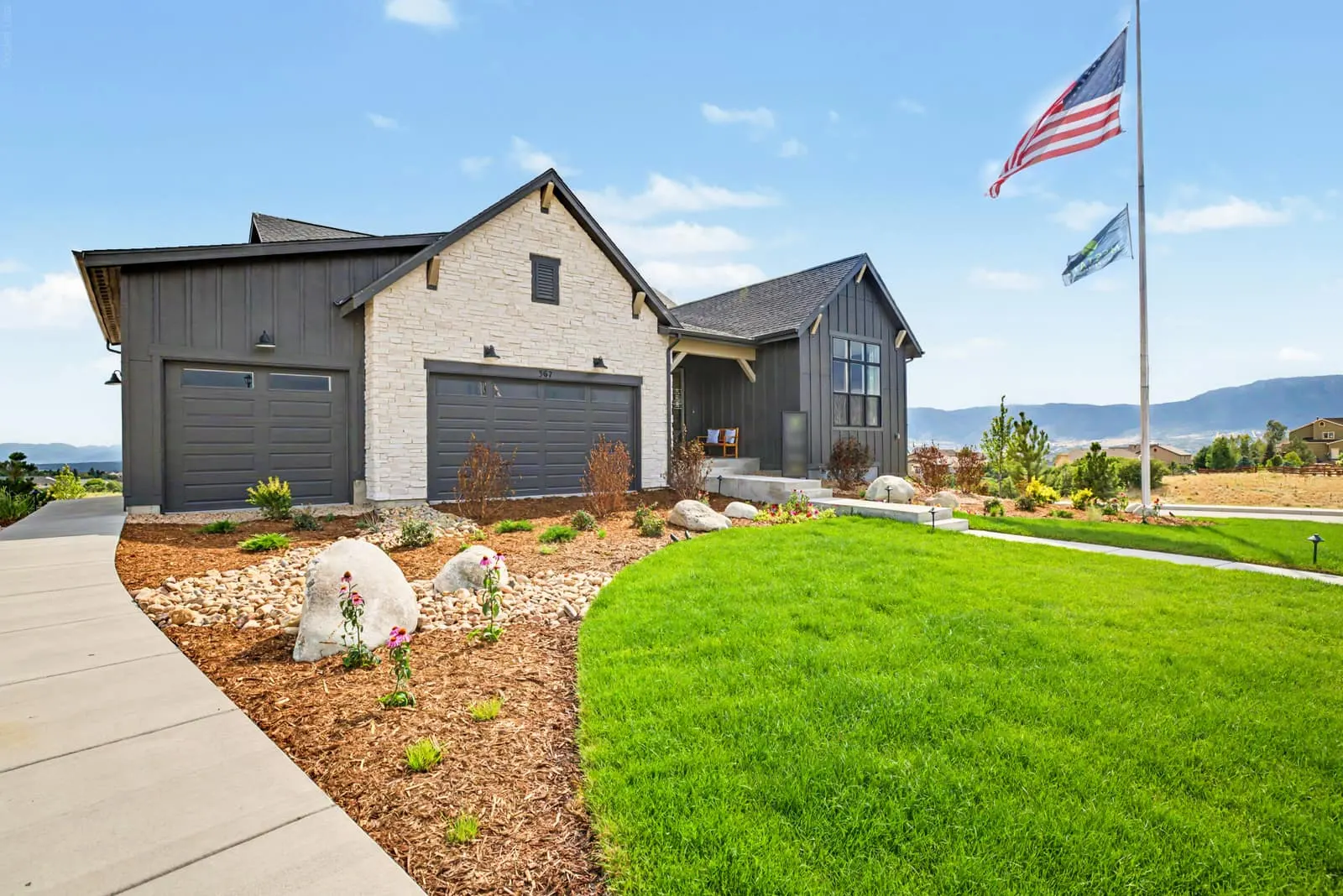 Home exterior with landscaped grounds at Jackson Creek in Monument, CO 80132