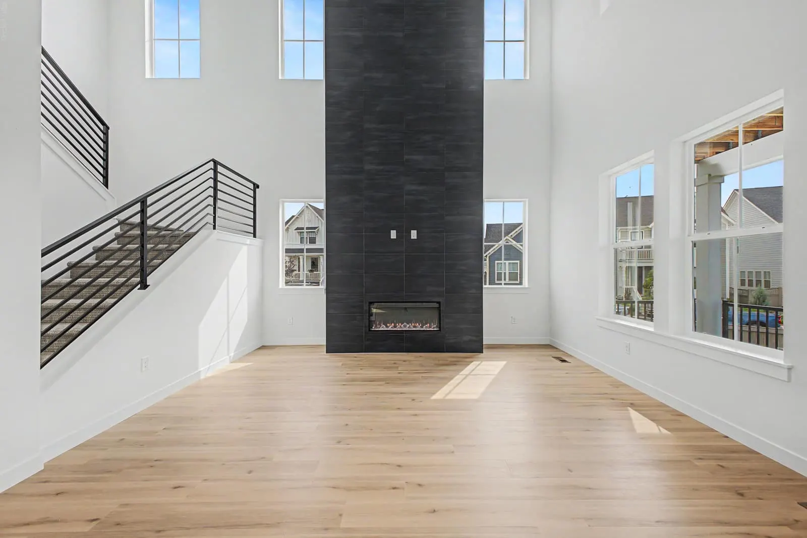 Front entry beside an open staircase at 1771 Chestnut Avenue in Westerly, Erie, Colorado