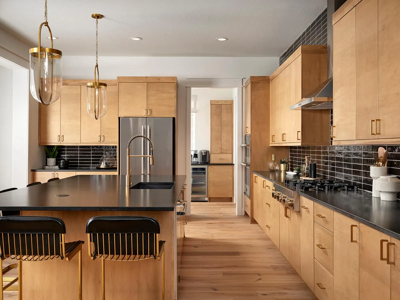 Kitchen cabinetry and island at 1781 Chestnut Ave in Westerly, Erie, Colorado