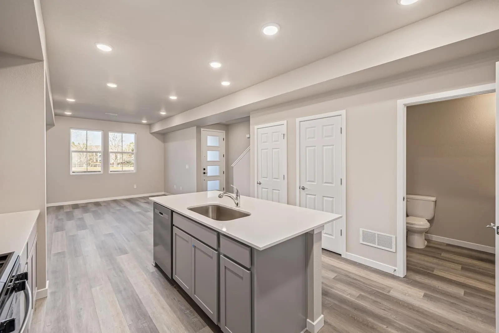 Kitchen island and cabinetry at 2899 E 103rd Drive in Arras Park, Thornton, Colorado