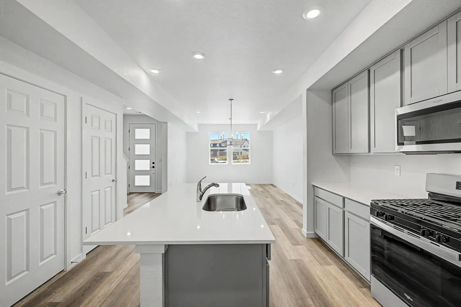Kitchen sink and cabinetry at 2897 E. 103rd Drive in Arras Park, Thornton, Colorado