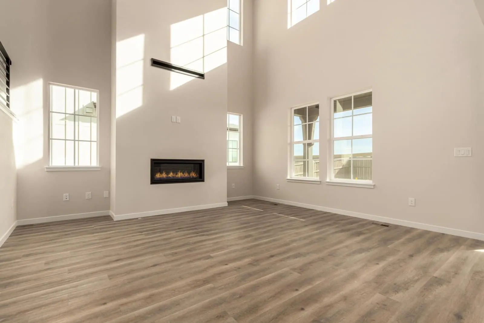 Living room with wood flooring at 1898 Hickory Ave in Westerly, Erie, Colorado