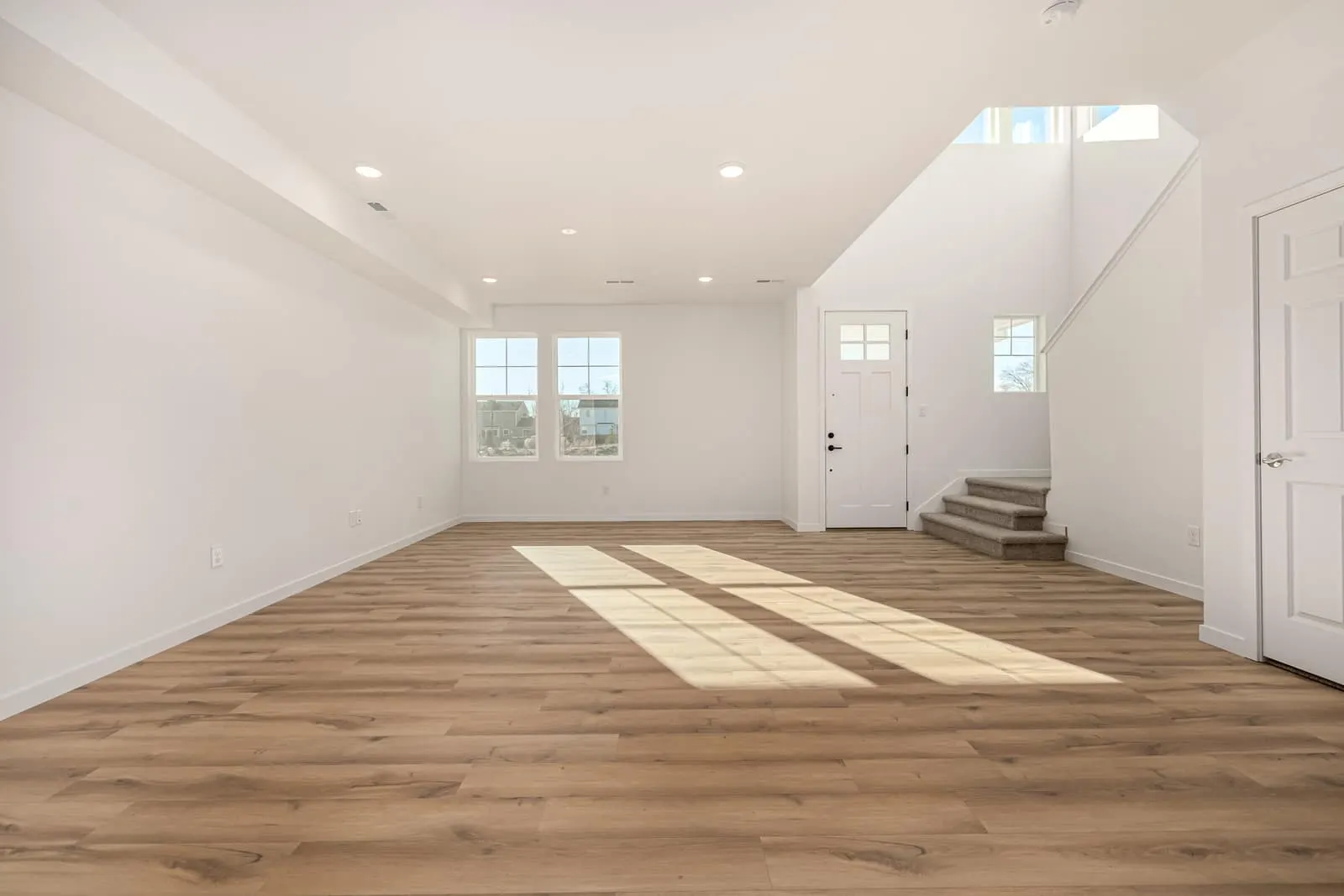 Living room with wood flooring at 2631 E. 102nd Place in Arras Park, Thornton, Colorado
