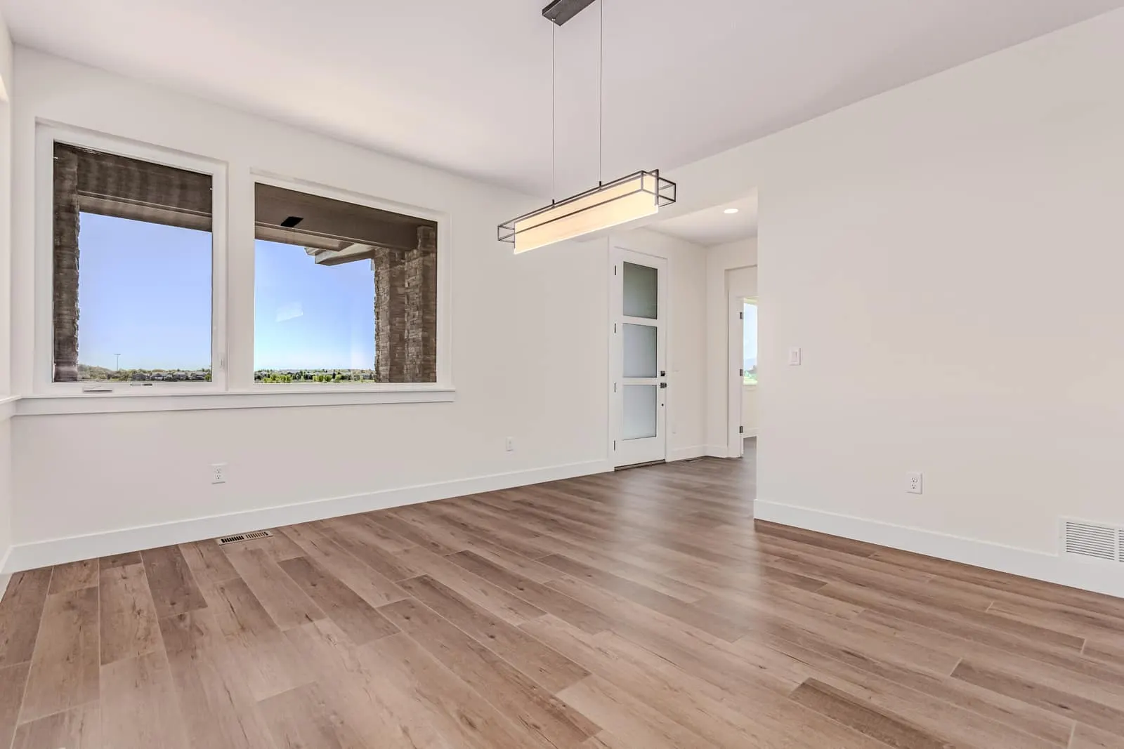 Living room with wood flooring at 763 Mountain Drive in West Grange, Longmont, Colorado