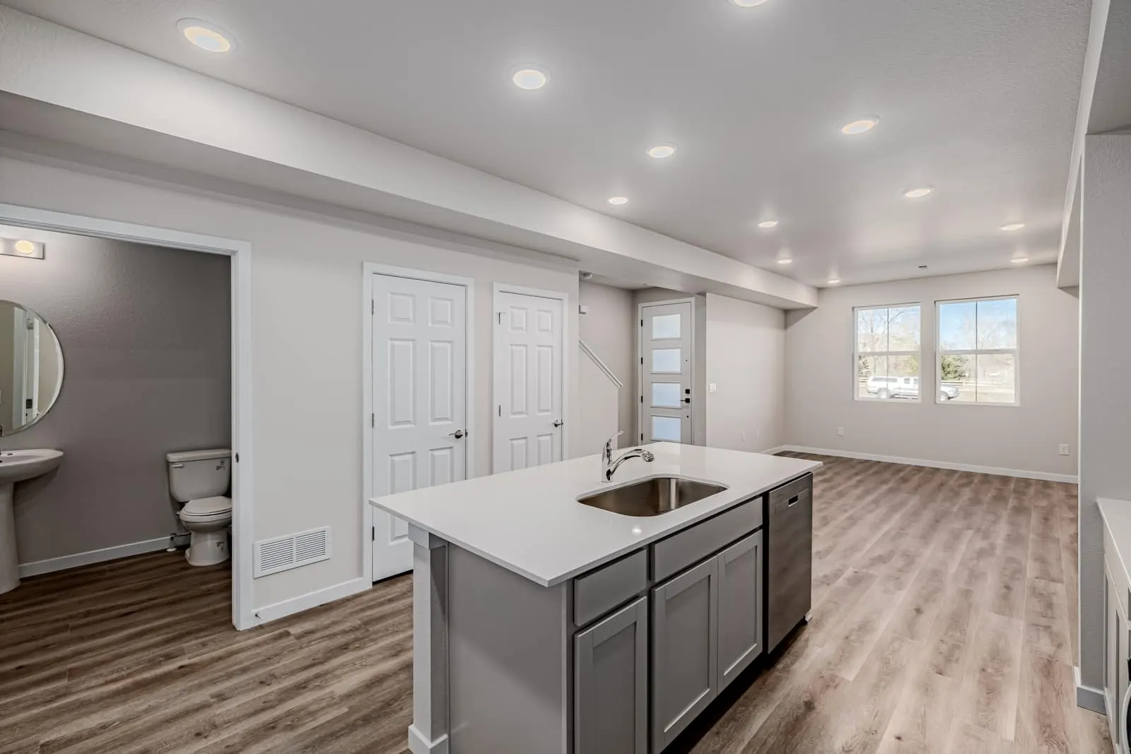 Open kitchen and living room at 2889 E 103rd Drive in Arras Park, Thornton, Colorado