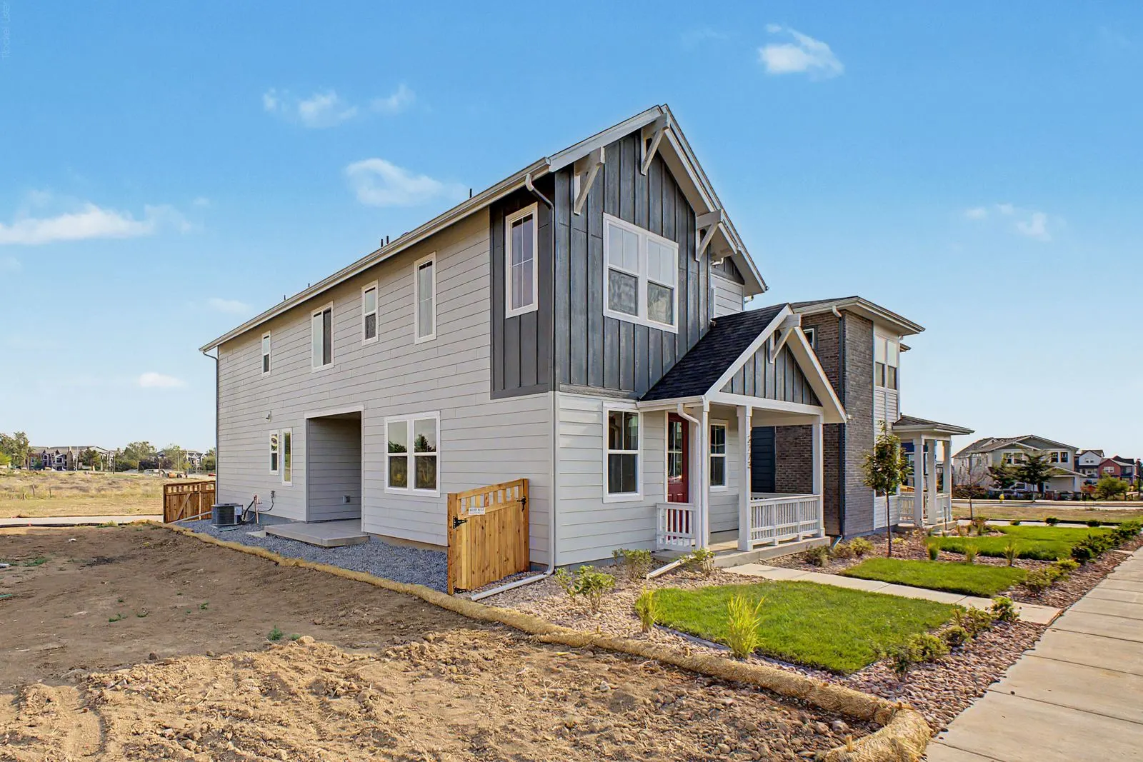 Side view of home and lawn at 2773 E. 103rd Ave in Arras Park, Thornton, Colorado
