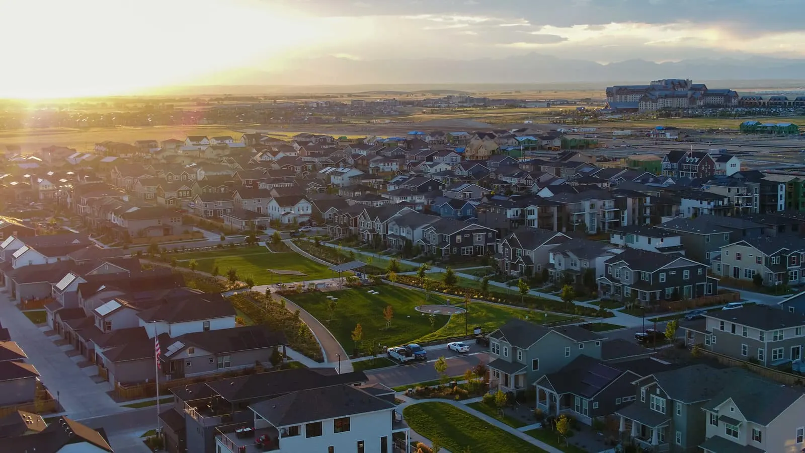 Aerial neighborhood view at sunset at Painted Prairie in Aurora, CO 80019