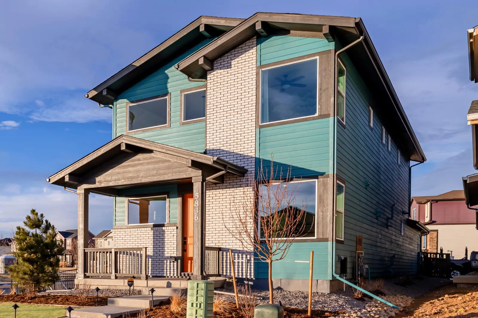 Side view of a two-story home at Painted Prairie in Aurora, CO 80019