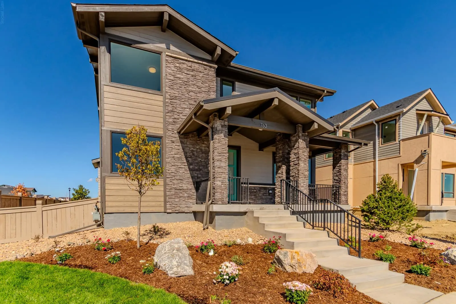 Home exterior and front landscaping at West Grange in Longmont, CO 80503