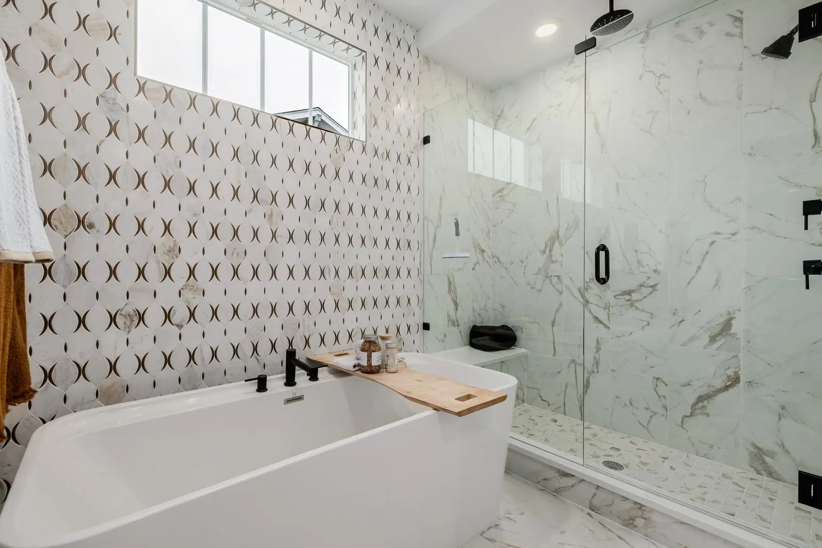 Bathroom with soaking tub and glass shower at Westerly in Erie, CO 80516