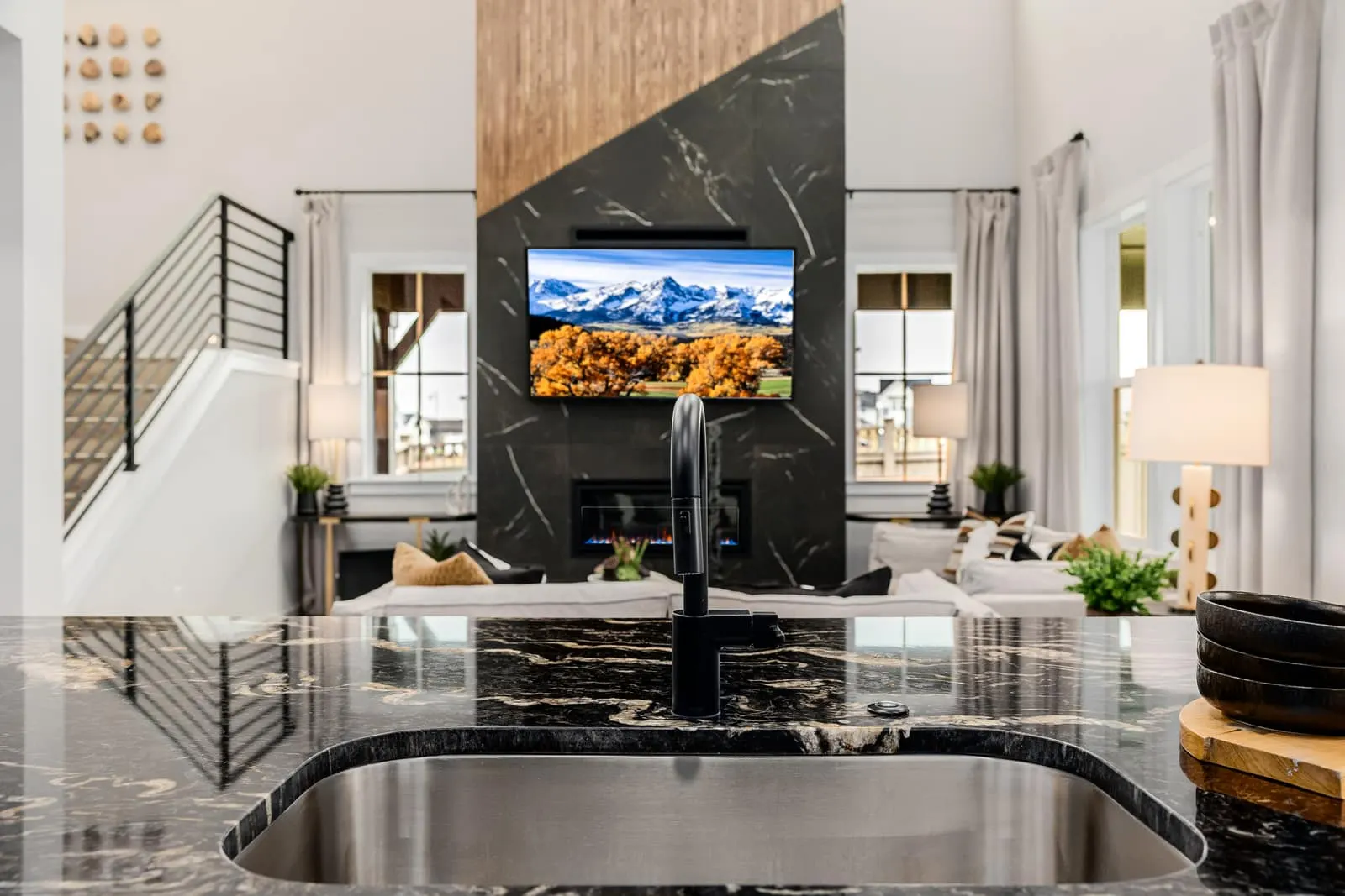 Living room and open staircase at Westerly in Erie, CO 80516